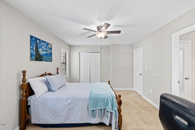 18 Willow Bridge Dr, Durham, NC 27707 - carpeted bedroom with a closet, ceiling fan, and a textured ceiling