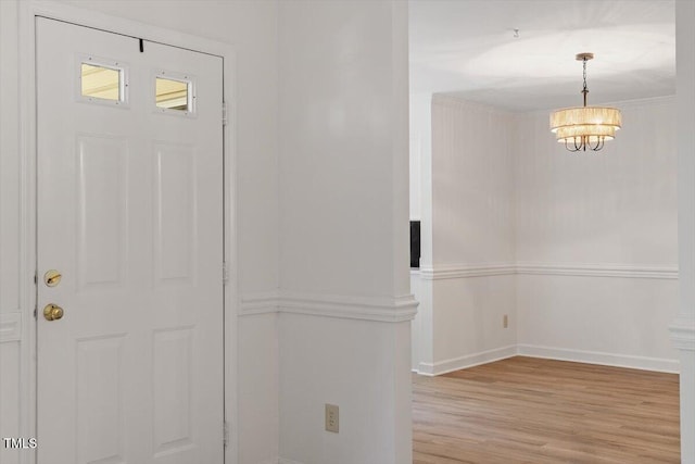 449 Summerwalk Cir, Chapel Hill, NC 27517 - foyer with wood finished floors and a chandelier