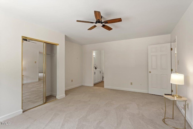 449 Summerwalk Cir, Chapel Hill, NC 27517 - unfurnished bedroom featuring light carpet, ensuite bath, a closet, and a ceiling fan