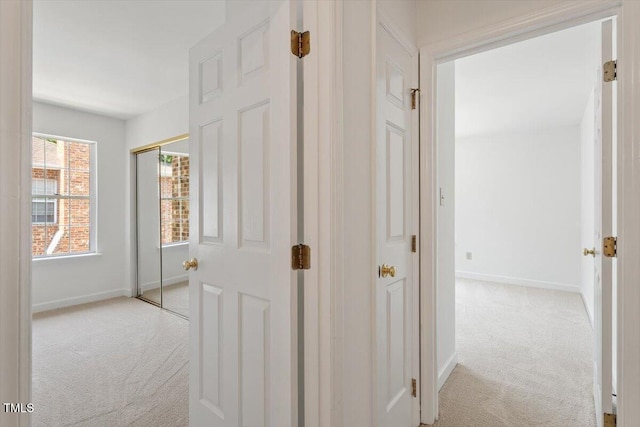 449 Summerwalk Cir, Chapel Hill, NC 27517 - hallway featuring light colored carpet and baseboards