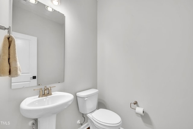 115 Circle City Way, Pittsboro, NC 27312 - half bathroom featuring toilet and a sink