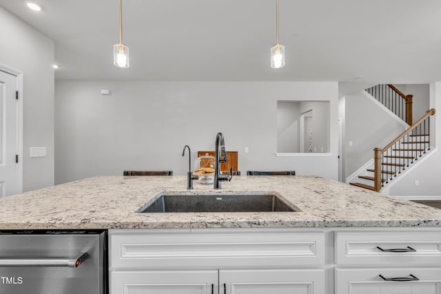 115 Circle City Way, Pittsboro, NC 27312 - kitchen with dishwasher, white cabinetry, light stone countertops, pendant lighting, and recessed lighting