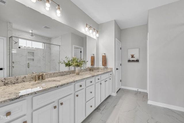 115 Circle City Way, Pittsboro, NC 27312 - full bath with a marble finish shower, double vanity, and marble finish floors