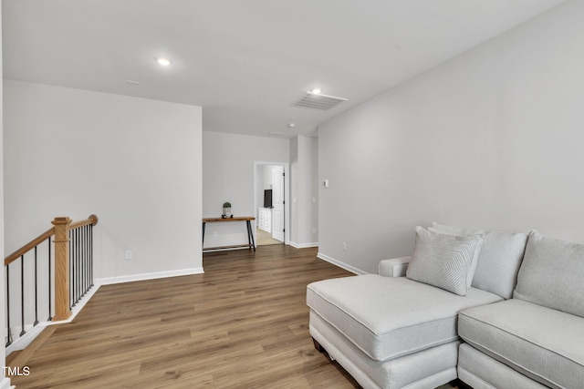 115 Circle City Way, Pittsboro, NC 27312 - living room with light wood finished floors and recessed lighting