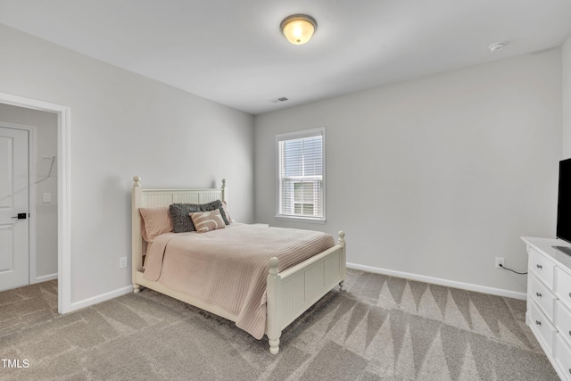 115 Circle City Way, Pittsboro, NC 27312 - bedroom featuring light colored carpet and baseboards