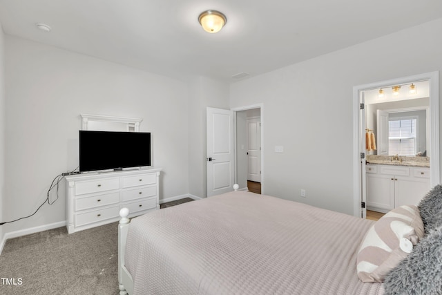 115 Circle City Way, Pittsboro, NC 27312 - bedroom with ensuite bath and light colored carpet