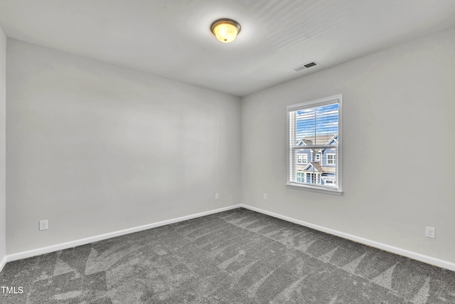 115 Circle City Way, Pittsboro, NC 27312 - empty room featuring dark carpet