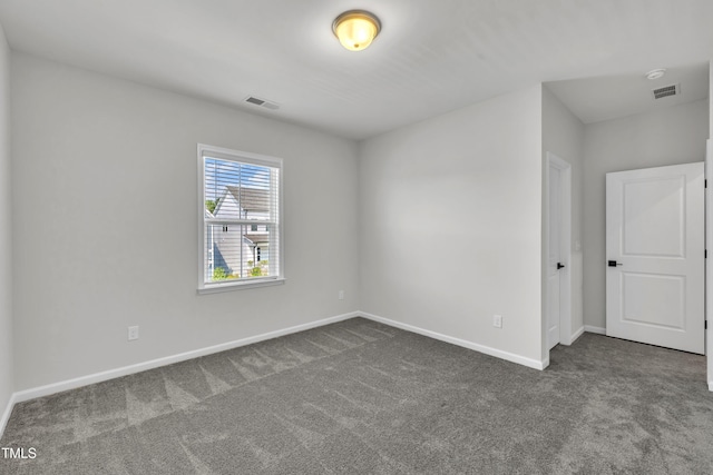115 Circle City Way, Pittsboro, NC 27312 - empty room with dark carpet and baseboards