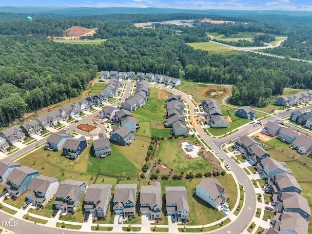 115 Circle City Way, Pittsboro, NC 27312 - aerial view of property and surrounding area featuring nearby suburban area