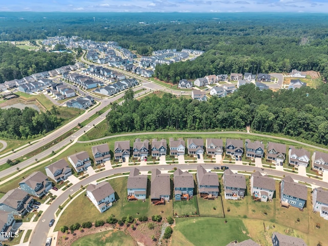 115 Circle City Way, Pittsboro, NC 27312 - view of property location with nearby suburban area and a heavily wooded area