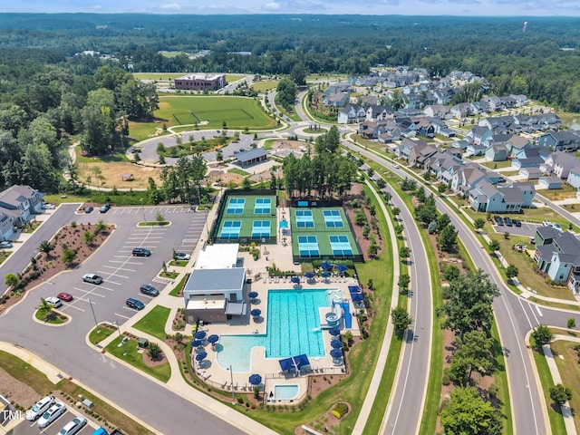115 Circle City Way, Pittsboro, NC 27312 - aerial view of property and surrounding area with a pool area and a heavily wooded area