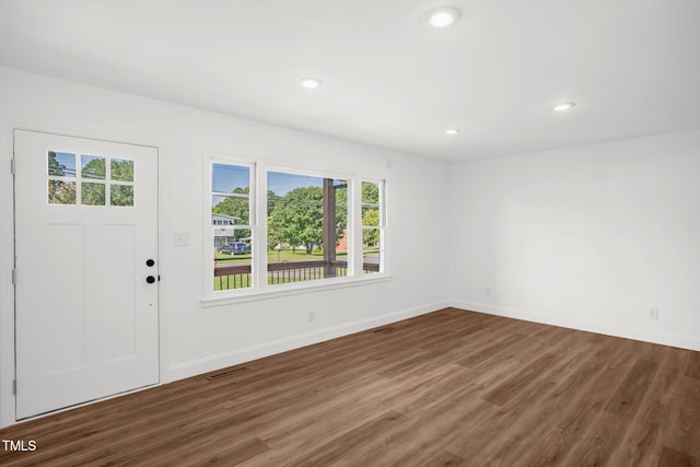 1907 Wilkins St, Burlington, NC 27217 - foyer with healthy amount of natural light, wood finished floors, and recessed lighting