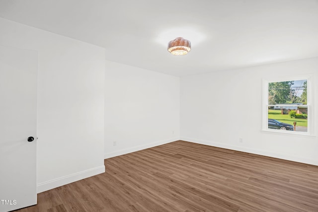 1907 Wilkins St, Burlington, NC 27217 - spare room featuring wood finished floors