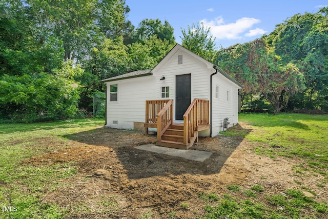 1907 Wilkins St, Burlington, NC 27217 - rear view of property featuring a yard and crawl space