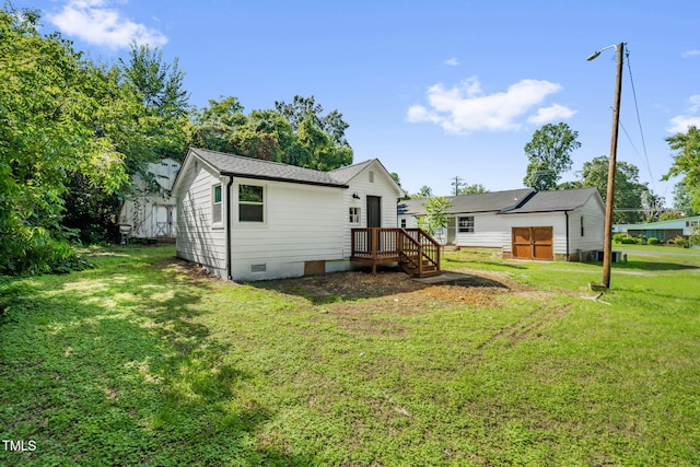 1907 Wilkins St, Burlington, NC 27217 - rear view of property with crawl space and a lawn