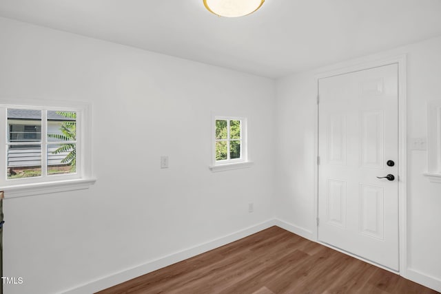 1907 Wilkins St, Burlington, NC 27217 - spare room with wood finished floors and baseboards