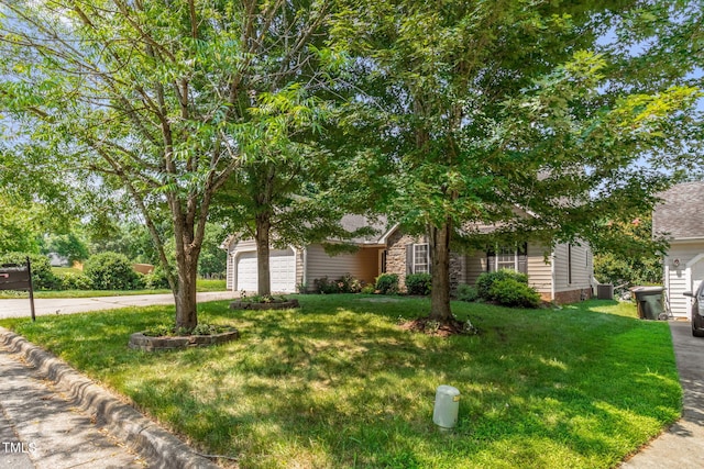 6001 Black Willow Dr, Greensboro, NC 27405 - view of property hidden behind natural elements with concrete driveway, an attached garage, a front yard, and roof with shingles
