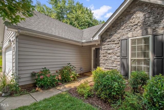 6001 Black Willow Dr, Greensboro, NC 27405 - entrance to property with roof with shingles and stone siding