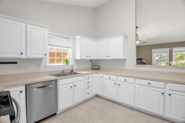 6001 Black Willow Dr, Greensboro, NC 27405 - kitchen featuring dishwasher, range, white cabinets, and light countertops