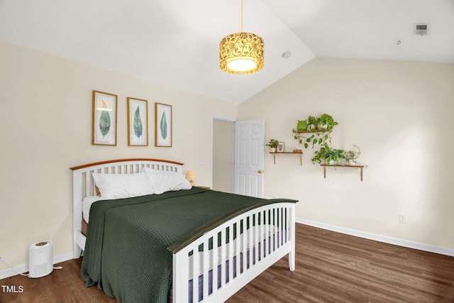 6001 Black Willow Dr, Greensboro, NC 27405 - bedroom featuring wood finished floors and vaulted ceiling