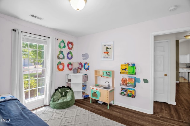 6001 Black Willow Dr, Greensboro, NC 27405 - bedroom featuring wood finished floors and baseboards