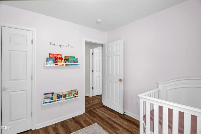 6001 Black Willow Dr, Greensboro, NC 27405 - bedroom featuring wood finished floors and a crib