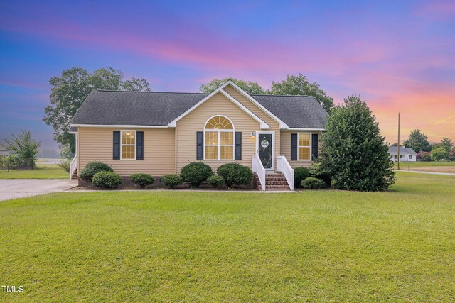 16 Emily Ct, Newton Grove, NC 28366 - view of front of house featuring a lawn and a shingled roof