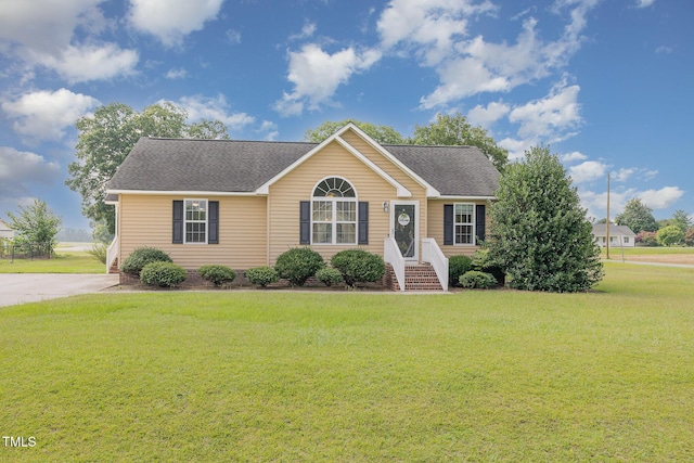 16 Emily Ct, Newton Grove, NC 28366 - ranch-style home featuring roof with shingles and a front lawn