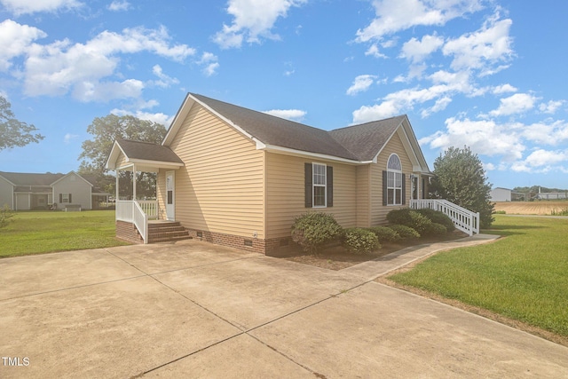 16 Emily Ct, Newton Grove, NC 28366 - view of side of home featuring crawl space, a lawn, roof with shingles, and concrete driveway