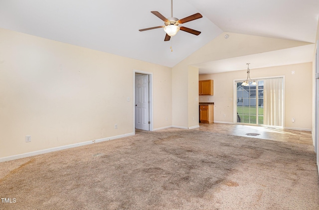 16 Emily Ct, Newton Grove, NC 28366 - unfurnished living room featuring a ceiling fan, light carpet, high vaulted ceiling, and a chandelier