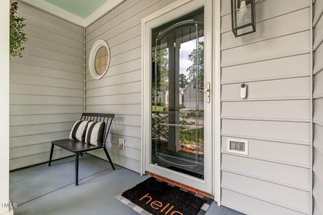 5609 Edgebury Rd, Raleigh, NC 27613 - view of exterior entry featuring a porch