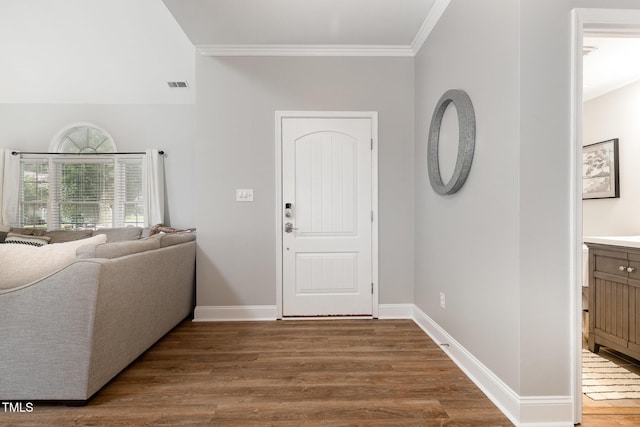 5609 Edgebury Rd, Raleigh, NC 27613 - foyer entrance with crown molding and wood finished floors