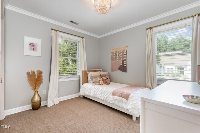 5609 Edgebury Rd, Raleigh, NC 27613 - bedroom featuring crown molding and light colored carpet