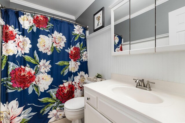 5609 Edgebury Rd, Raleigh, NC 27613 - bathroom with vanity, crown molding, and a shower with shower curtain