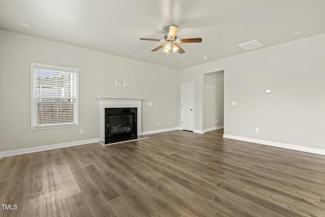 245 E Webber Ln, Clayton, NC 27527 - unfurnished living room with ceiling fan, wood finished floors, and a glass covered fireplace