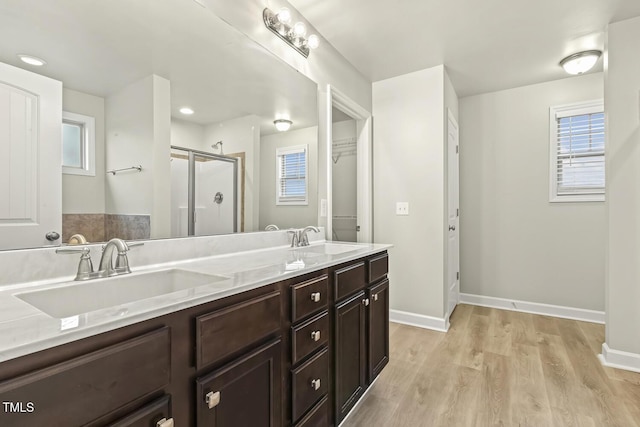 245 E Webber Ln, Clayton, NC 27527 - full bath with a shower stall, wood finished floors, and double vanity