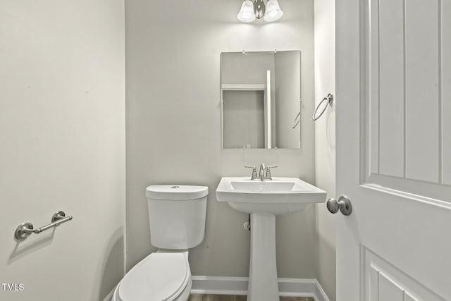 245 E Webber Ln, Clayton, NC 27527 - bathroom featuring toilet and baseboards