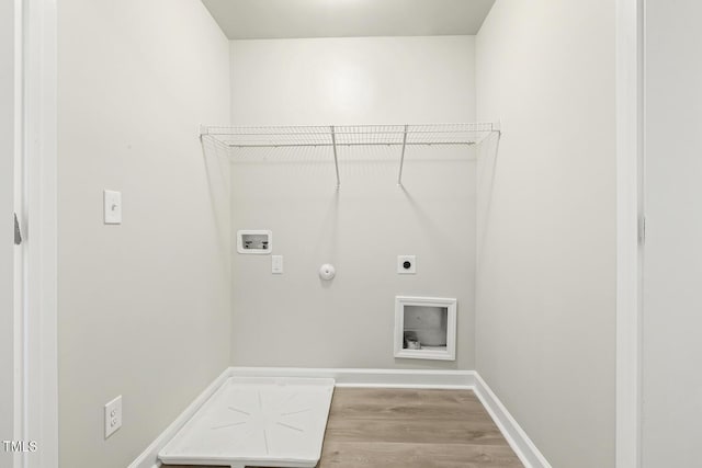245 E Webber Ln, Clayton, NC 27527 - laundry area with electric dryer hookup, gas dryer hookup, hookup for a washing machine, and light wood-style floors