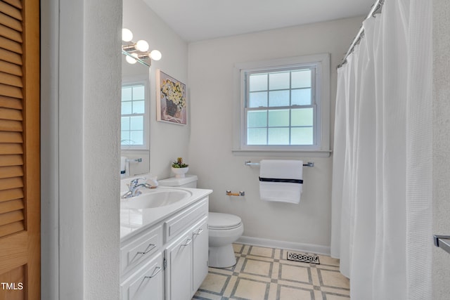906 Cindy St, Cary, NC 27511 - bathroom featuring healthy amount of natural light, vanity, and tile patterned floors
