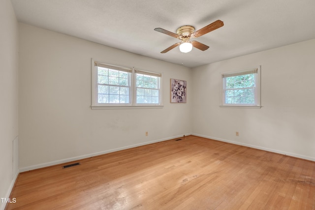 906 Cindy St, Cary, NC 27511 - unfurnished room with light wood-style flooring and ceiling fan