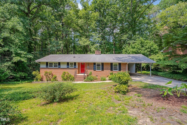 906 Cindy St, Cary, NC 27511 - ranch-style house with brick siding, a carport, a chimney, and driveway