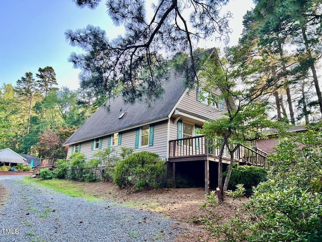612 Williamsboro St, Oxford, NC 27565 - view of property exterior with a deck and a shingled roof