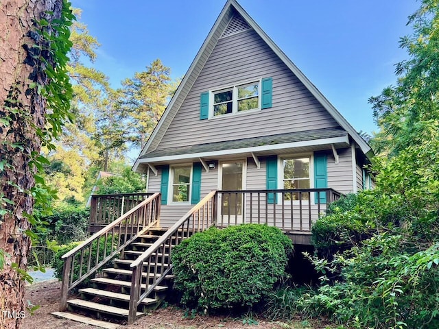 612 Williamsboro St, Oxford, NC 27565 - view of front of house featuring stairs and covered porch
