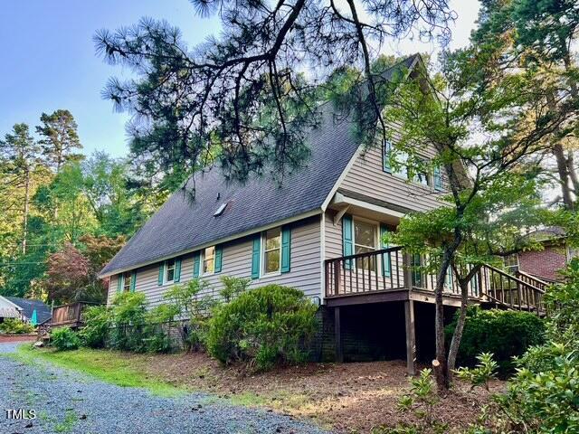 612 Williamsboro St, Oxford, NC 27565 - view of property exterior with a wooden deck and a shingled roof