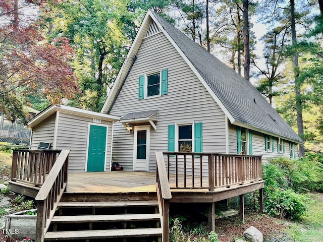 612 Williamsboro St, Oxford, NC 27565 - rear view of house with a wooden deck and roof with shingles