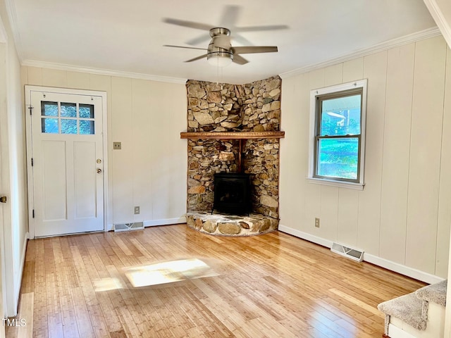 612 Williamsboro St, Oxford, NC 27565 - unfurnished living room featuring wood-type flooring, ornamental molding, and a ceiling fan
