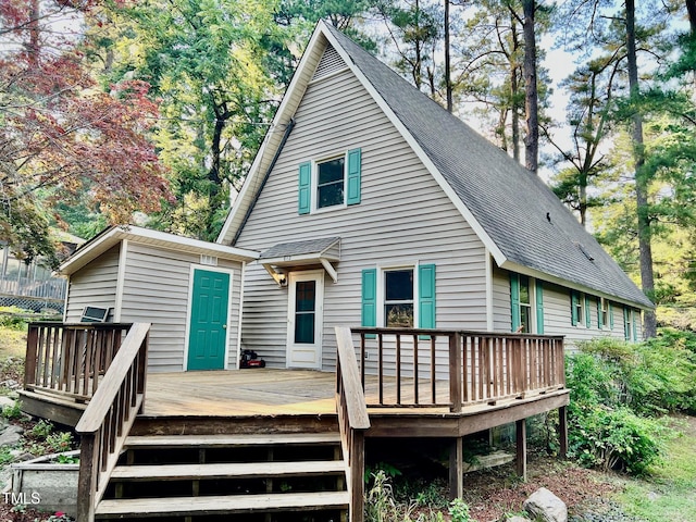 612 Williamsboro St, Oxford, NC 27565 - back of property featuring a shingled roof and a deck