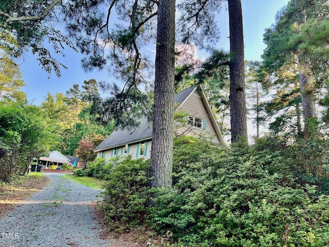 612 Williamsboro St, Oxford, NC 27565 - view of side of home with gravel driveway