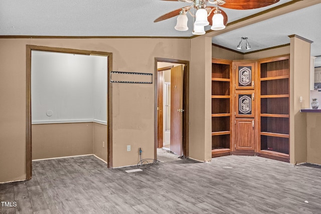 112 Elsie Marie Dr, Youngsville, NC 27596 - unfurnished bedroom featuring ornamental molding, wood finished floors, lofted ceiling, and ceiling fan