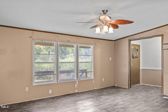 112 Elsie Marie Dr, Youngsville, NC 27596 - spare room with ceiling fan, wood finished floors, crown molding, and a textured ceiling